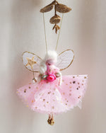 Load image into Gallery viewer, Decorative fairy ornament with pink dress and gold accents on a neutral background
