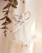 Load image into Gallery viewer, Decorative fairy hanging ornament with gold leaves on a soft beige background
