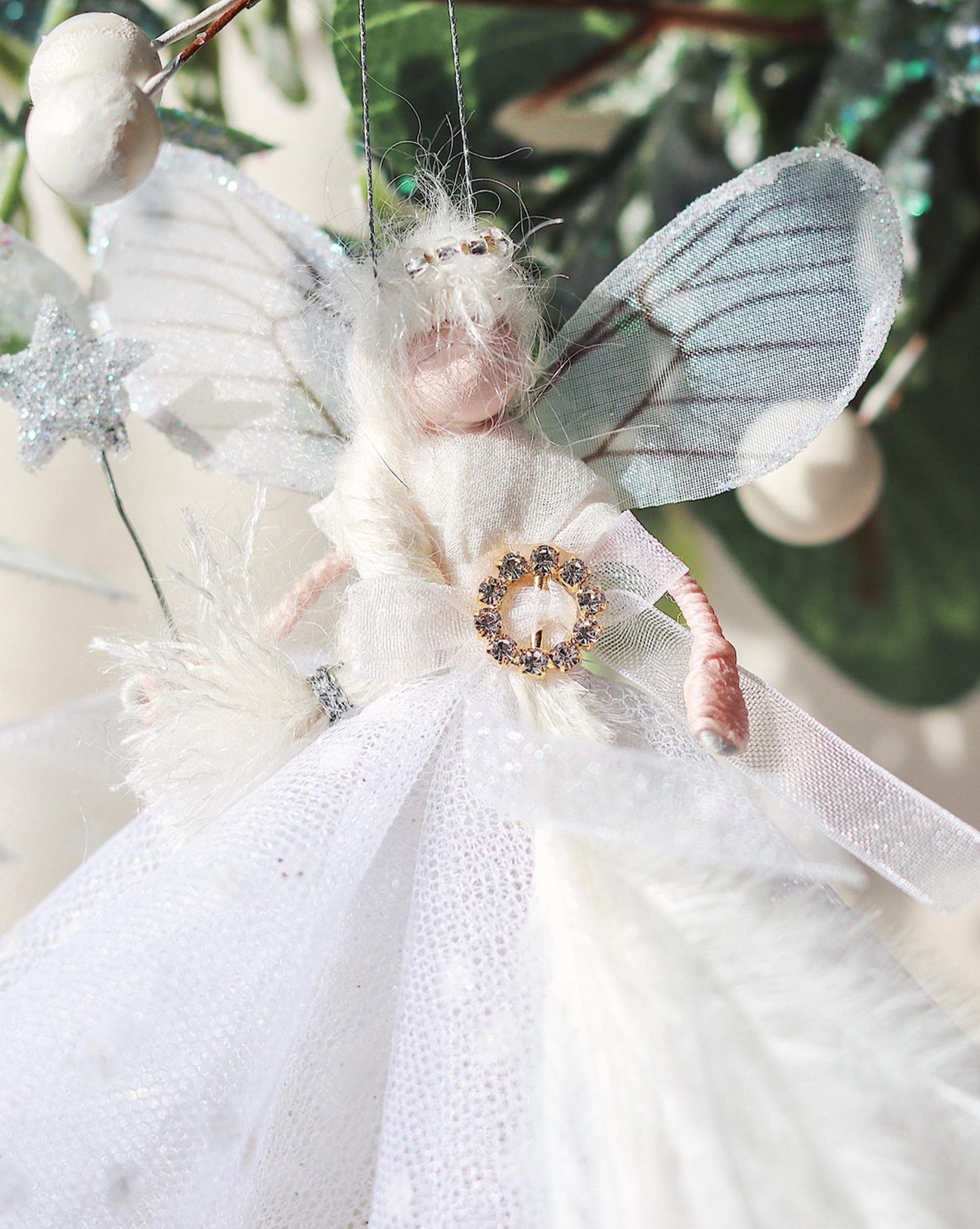 Snowflake Fairy holding a silver wand with glitter details, an exquisite handmade Christmas decoration