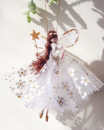 Load image into Gallery viewer, ‘Hope’ Fairy Decoration, Handmade fairy decoration that makes the perfect heirloom gift for Birthdays, Easter and Special Occasions. wearing a white and gold floral dress with a handmade gold glitter wand and delicate wings. brown haired fairy
