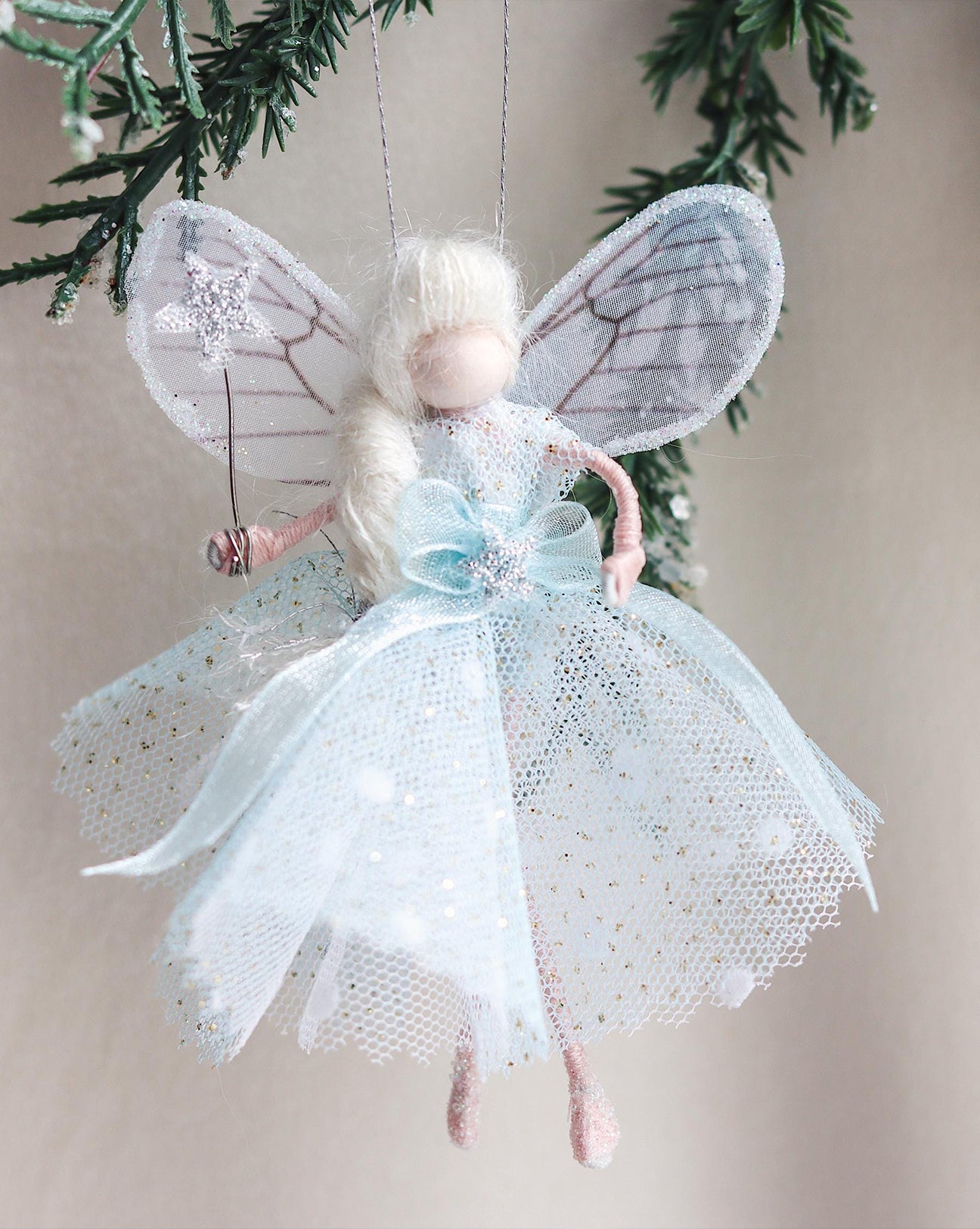 Looking for the perfect gift or a magical addition to your Christmas tree? This handcrafted fairy is a one-of-a-kind treasure, lovingly made by a skilled bridal designer from her most cherished fabrics. Each fairy is a special keepsake, destined to become a family heirloom.