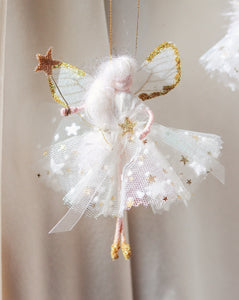 Florialice 'Snow Fairy' dressed in a beautiful white dress with spots and stars, gold glittered wings and sparkly magic wand. Handmade fairy decoration that makes the perfect heirloom gift for Birthdays and Special Occasions.