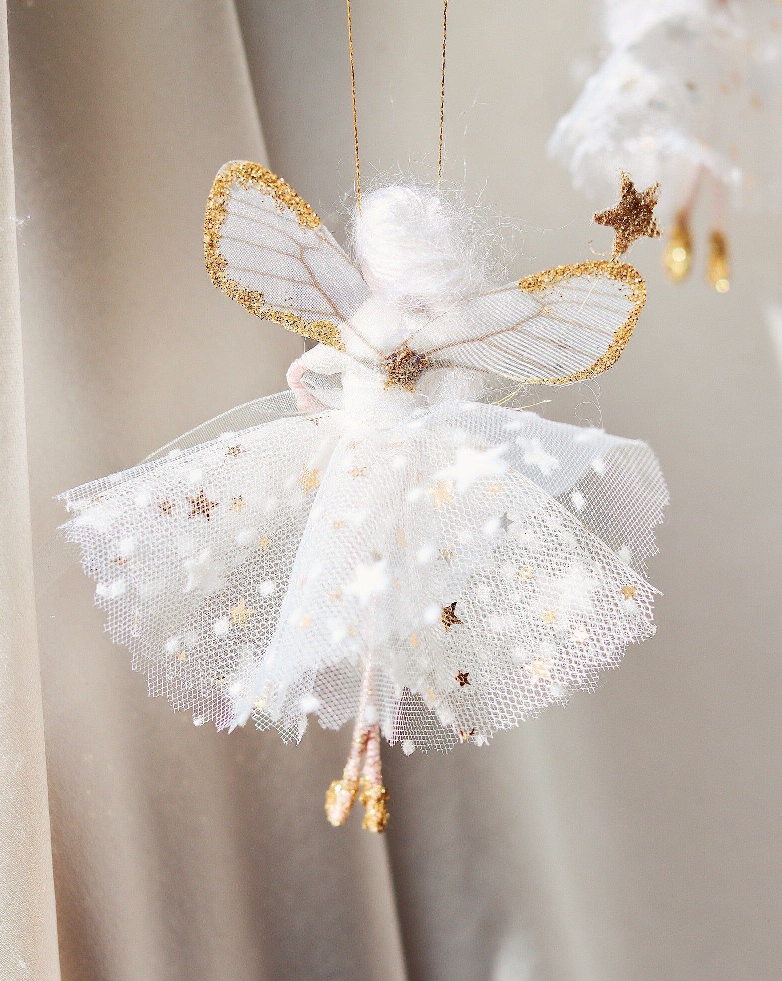 Back of the fairy. Florialice fairy dancing in the light. Christmas gift for girls. Heirloom decoration