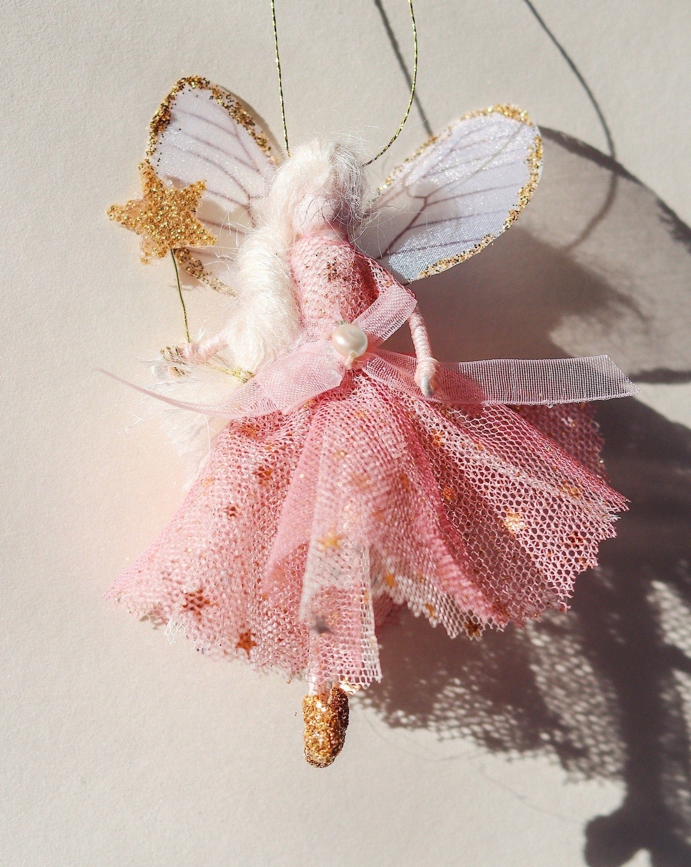 Each Florialice fairy is lovingly created using cotton, silks, tulle, delicate embellishments, and a magic wand... Every fairy will slightly differ, which gives them their unique character. Their wings are made from the Silk Organza, which really does make the fairies come to life!