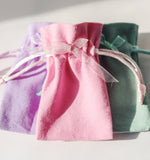 Load image into Gallery viewer, tooth fairy bags in pink, lilac, green with ribboon

